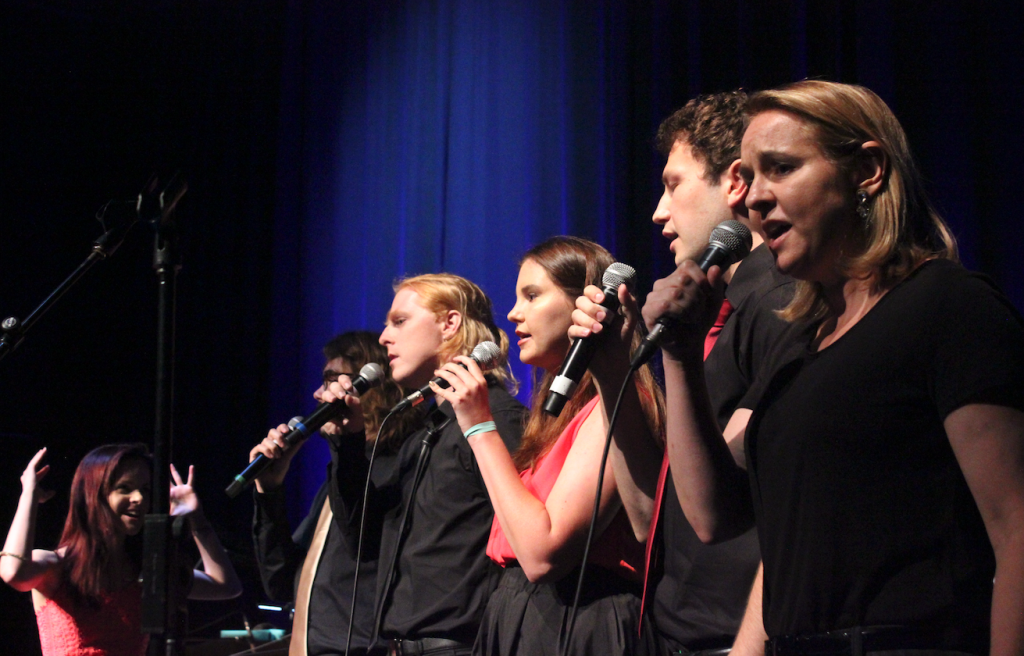 Sono Music Vocal Ensemble perform on stage. 